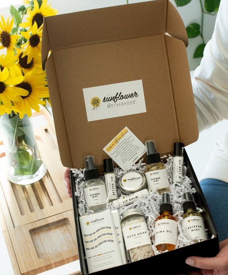 Sunflower beauty box featuring vibrant sunflowers and beauty products, elegantly arranged for a visually appealing display.