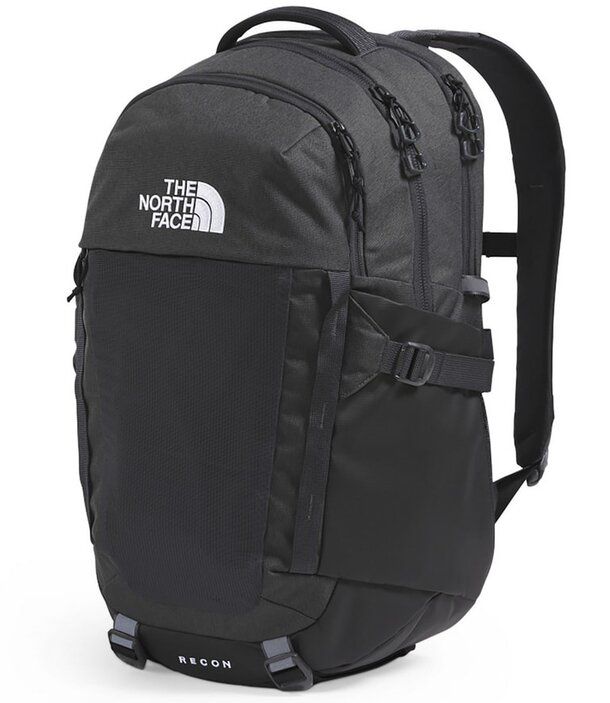 North Face Surge backpack displayed, featuring multiple compartments and a sleek design suitable for travel and daily use. 