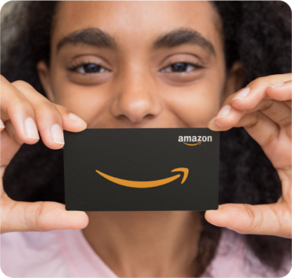 Person holding an Amazon gift card.