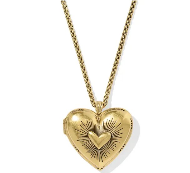 A gold heart pendant hanging from a delicate chain, showcasing a simple yet elegant design.