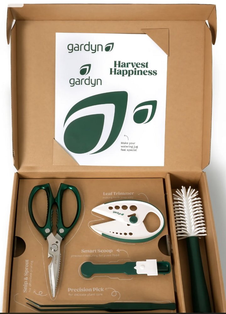 A colorful garden kit showcasing tools and seeds, symbolizing the joy of harvesting and nurturing plants.