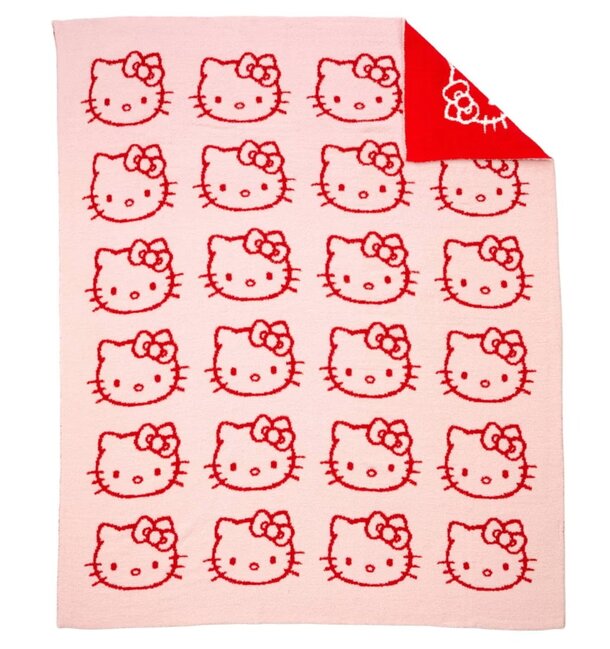 Hello Kitty blanket with lively red and pink patterns, highlighting the character in a fun and colorful design.