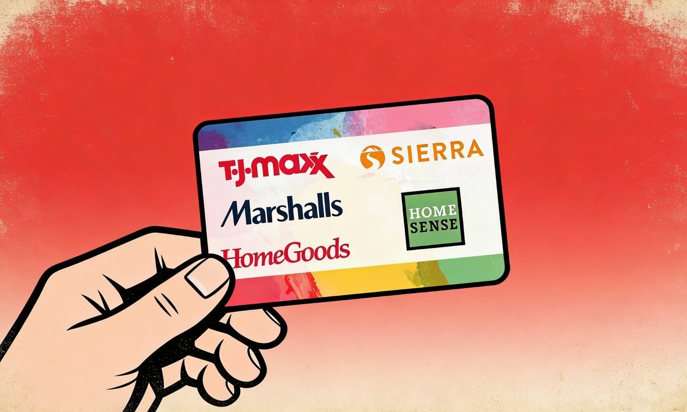 A hand holds a colorful gift card featuring store logos: T.J. Maxx, Marshalls, HomeGoods, Sierra, and HomeSense against a red gradient background.