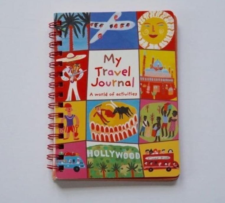 Spiral bound travel journal with colorful illustrations