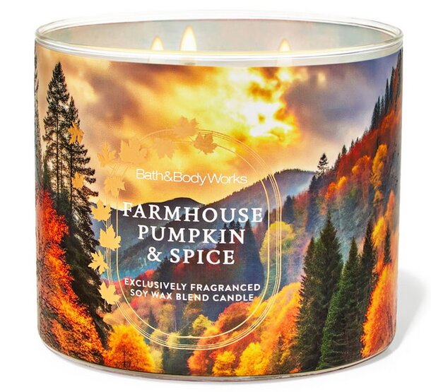 A farmhouse-style pumpkin spice candle, featuring warm autumn colors and a rustic design, exuding a cozy ambiance.