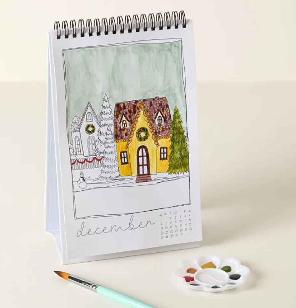 A calendar featuring a house and a paintbrush, symbolizing home improvement or renovation planning.