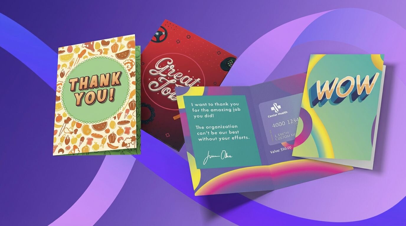 Hand holding red gift card with gold bow