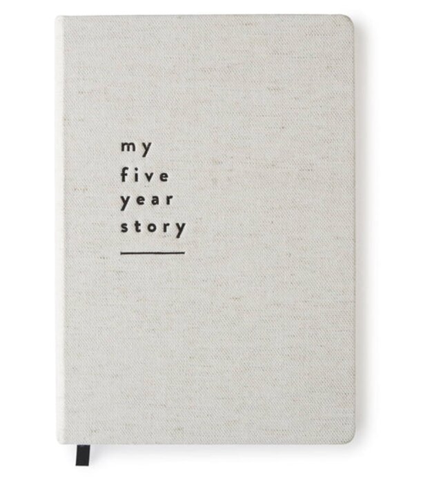 A notebook titled "My Five Year Story" with a colorful cover, symbolizing personal growth and reflection over time.