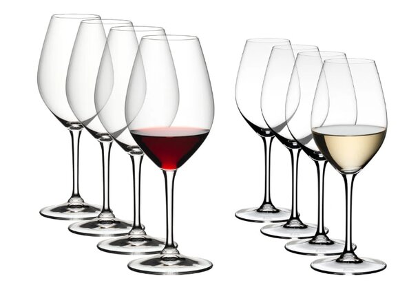 Set of 6 Riedel wine glasses arranged elegantly on a wooden surface, showcasing their fine crystal design.