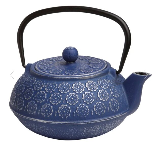 A blue tea kettle featuring a spout and a handle, resting on a white surface.