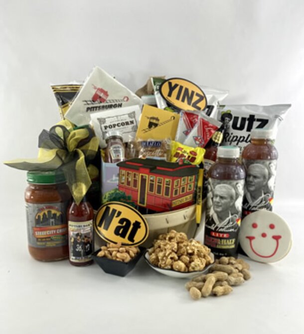 A beautifully arranged gift basket featuring a selection of Southern delicacies and treats.