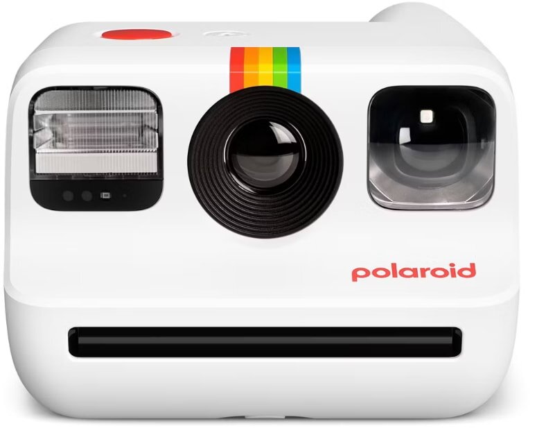 Close-up of a white Polaroid camera with a rainbow stripe. Features include a central lens, flash on the left, viewfinder on the right, and photo slot below. Bright and retro design.