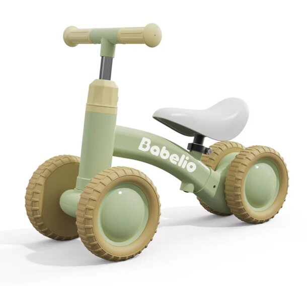A green and tan tricycle featuring the name "Bazilio" prominently displayed on its frame.