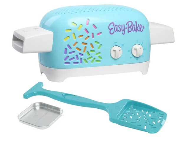 A toaster decorated with colorful sprinkles on its surface, showcasing a playful and whimsical design.