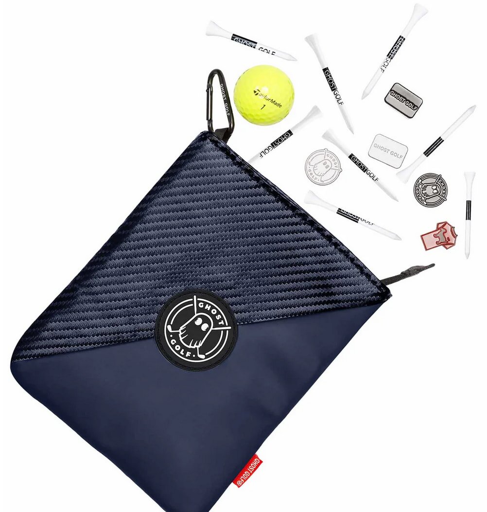 A skillet containing cooked potatoes topped with gooey cheese rests on a rustic table.