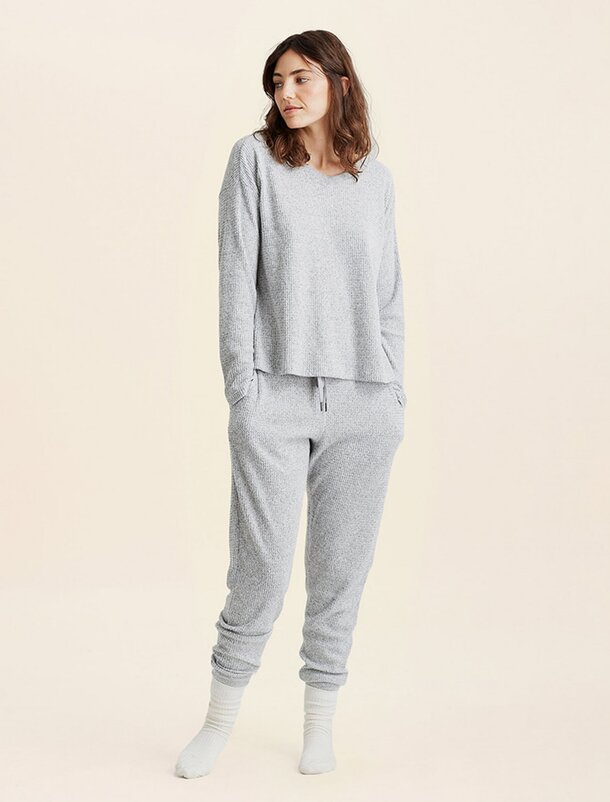 Soft, lightweight cotton women's pajamas displayed, showcasing comfort and style for a restful night's sleep.