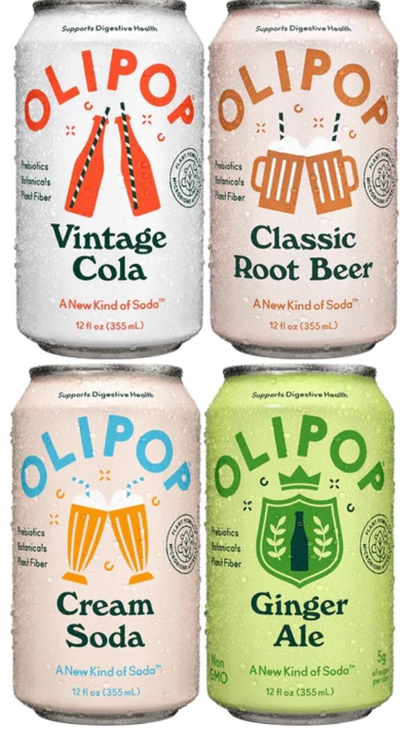 Four Olipop soda cans: Vintage Cola, Classic Root Beer, Cream Soda, and Ginger Ale, promoting digestive health benefits.