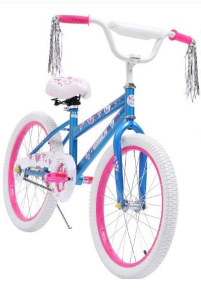 A girl's bike featuring vibrant pink and blue wheels, designed for fun and playful rides.