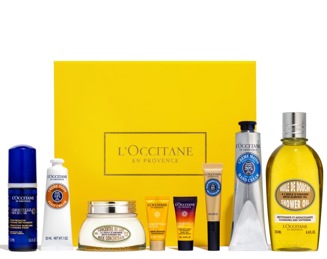 L'Occitane gift set featuring skincare products elegantly packaged in a decorative box with floral designs.