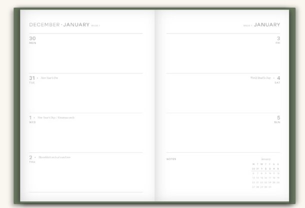 A green and white calendar displaying a blank page, indicating an open date for scheduling or planning.
