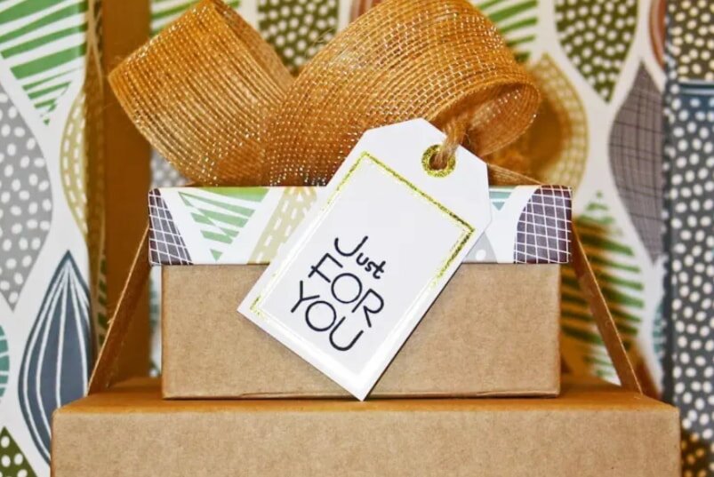 A colorful gift box with a tag reading "Just for you," symbolizing a thoughtful present.