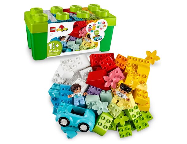 Colorful LEGO Duplo blocks arranged beside a green storage box on a flat surface.