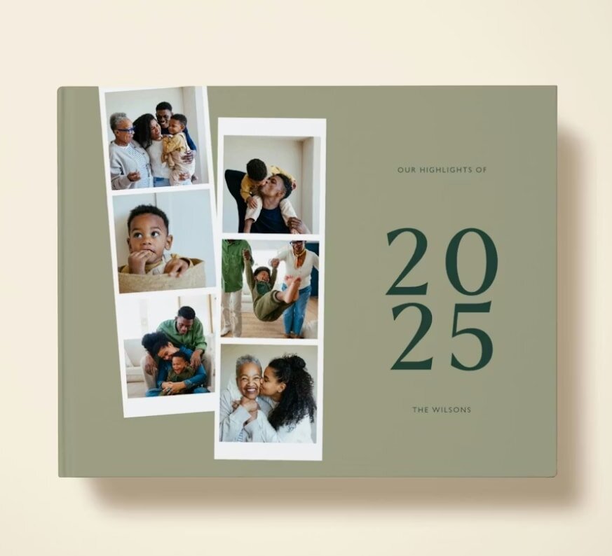 A green photo book featuring a family photo on the cover, showcasing cherished memories.