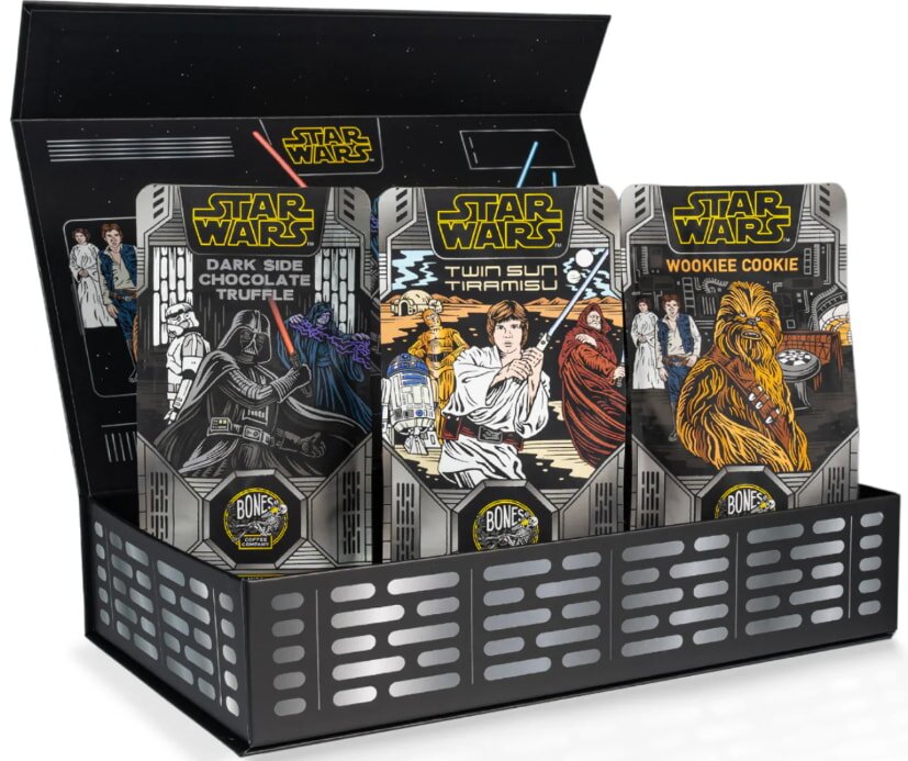 A gift box themed around Star Wars: The Force Awakens, featuring iconic characters and symbols from the film.