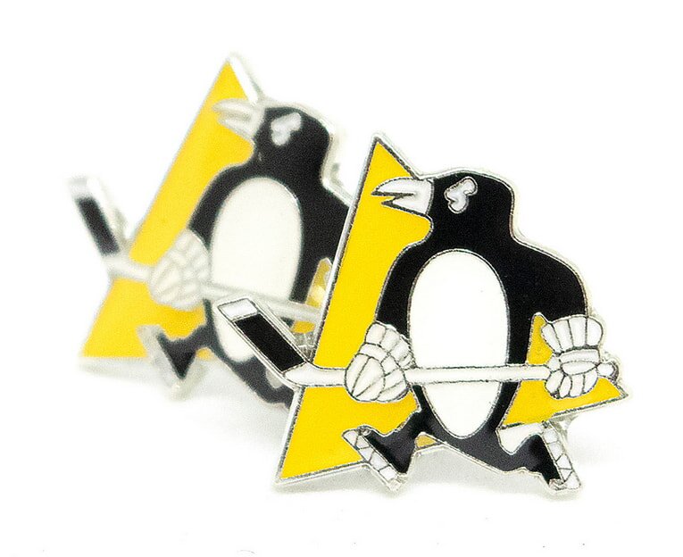 A pin badge featuring a cute penguin design, showcasing its distinctive black and white coloring.