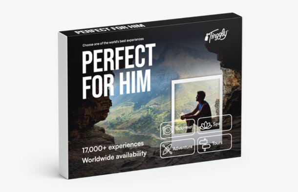 Gift box labeled "Perfect for Him" with scenic mountain view and silhouette of a man. Promotes 17,000+ global experiences like adventure, spa, tours, and gourmet.