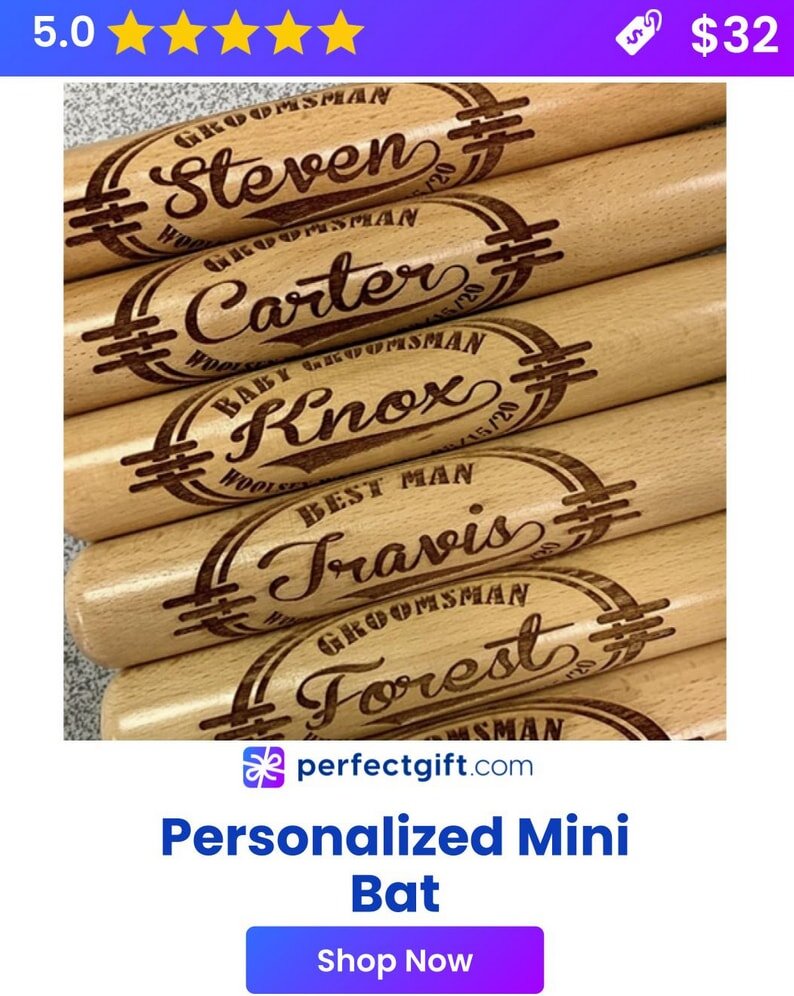 A personalized mini bat featuring a custom name engraved on the barrel, ideal for display or as a unique gift.  