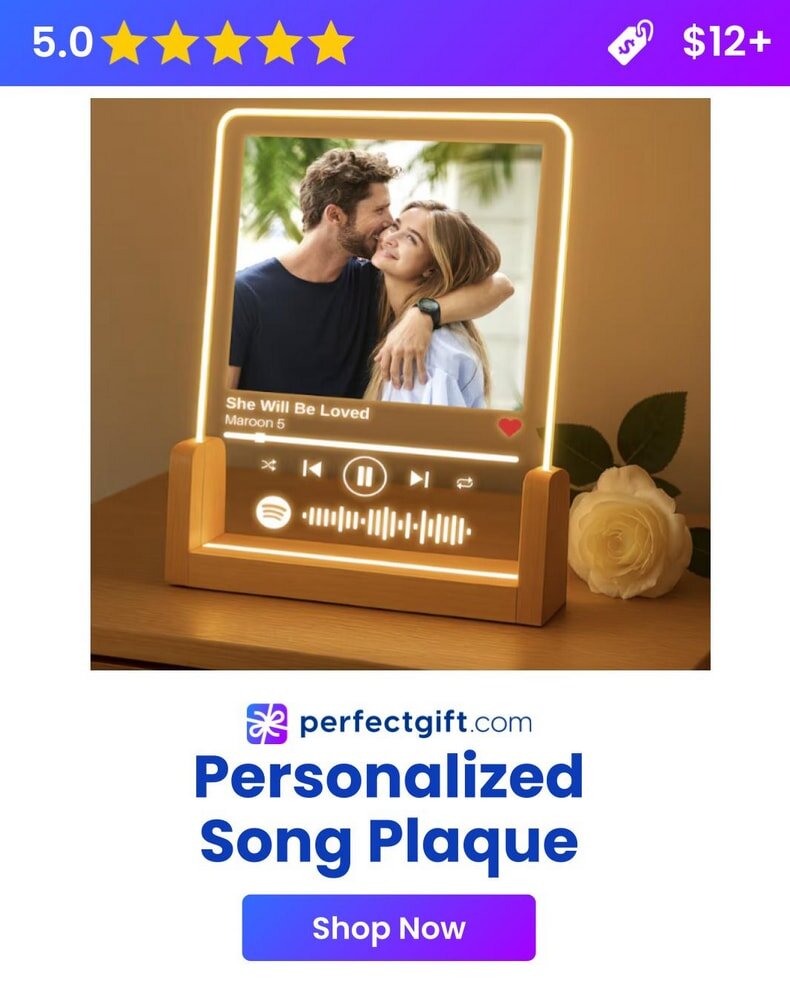 A glowing personalized song plaque featuring a couple and music details for "She Will Be Loved" by Maroon 5