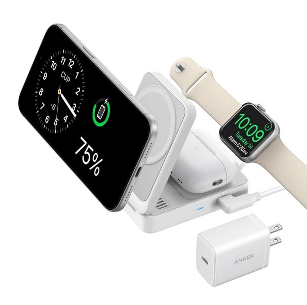 Phone, watch, and earbuds charging on a wireless dock, showing 75% battery. Anker adapter included.