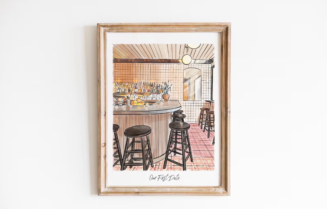 A framed artwork showcasing a modern bar scene featuring stools for seating.