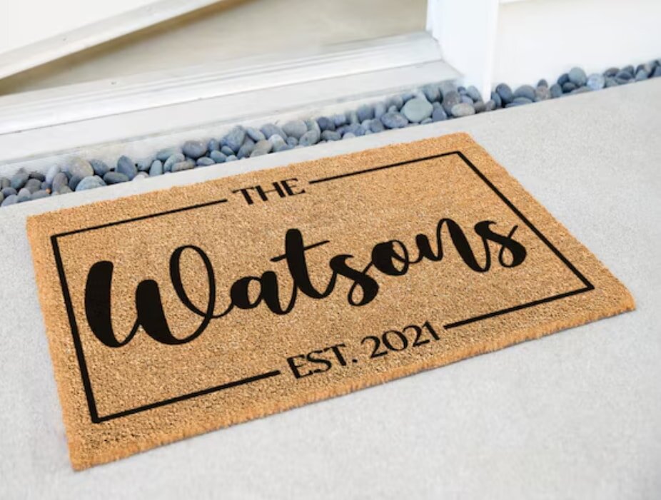 Personalized coir doormat with 'The Watsons EST. 2021' text