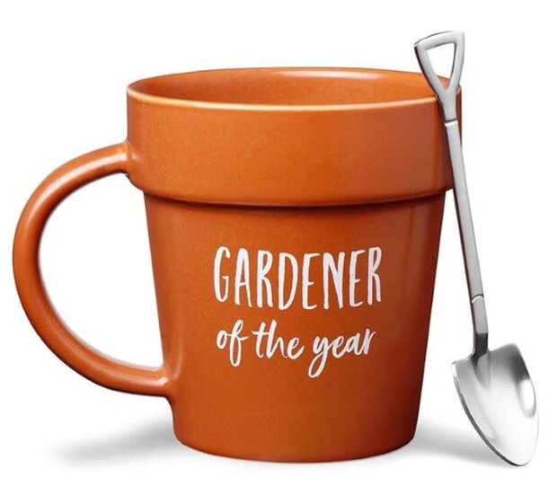 A ceramic mug featuring the title "Gardener of the Year" with floral designs, celebrating gardening achievements.
