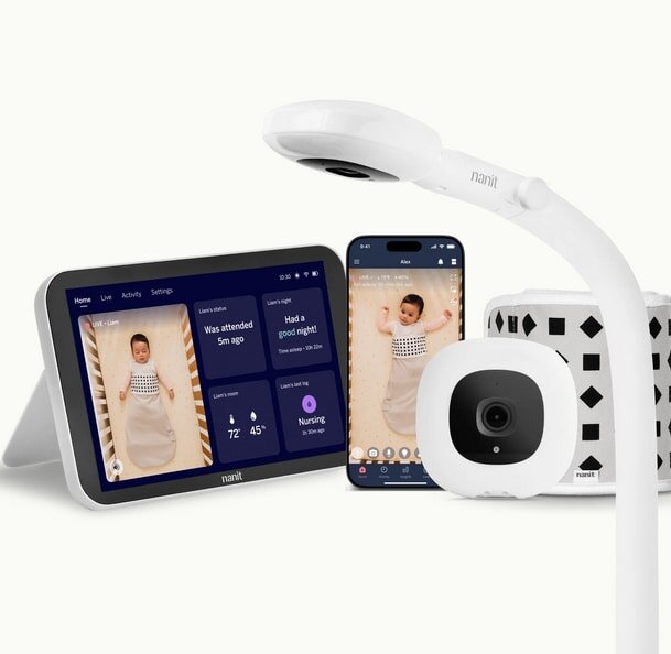 Smart baby monitor setup with a camera, tablet, and phone app displaying a sleeping baby. The scene conveys a sense of security and tech integration.