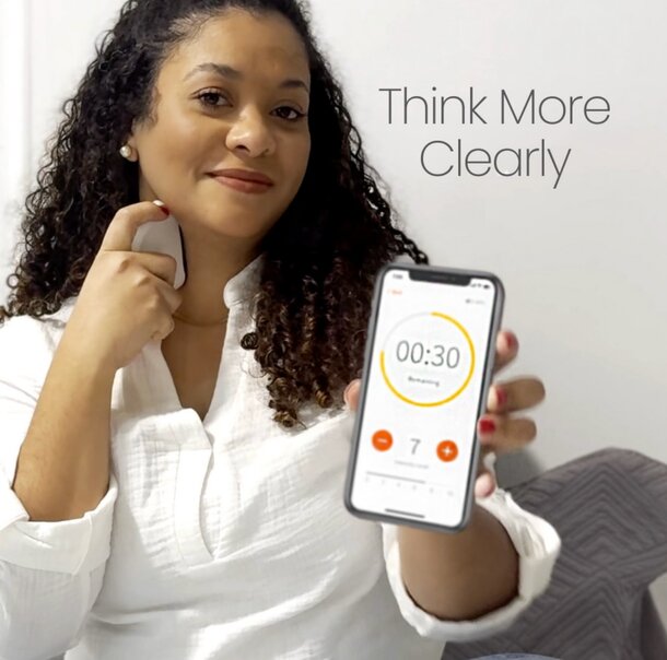 A woman holds a smartphone displaying the text "Think More Clearly," emphasizing clarity and focus.