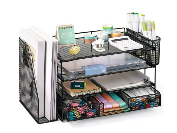 A black desk organizer filled with various pens and office supplies neatly arranged for easy access.
