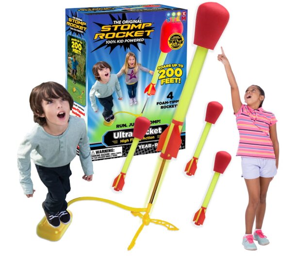 A child joyfully plays with a colorful toy rocket, imagining adventures in space.