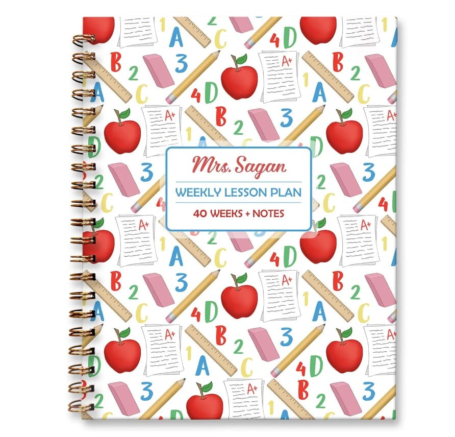 Spiral bound weekly lesson plan notebook with school supplies