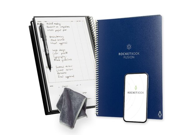 A closed notebook box featuring a simple design, resting on a wooden surface with soft lighting.