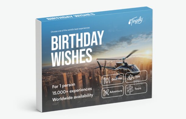 A whimsical illustration of a helicopter surrounded by balloons and a birthday cake, conveying joyful birthday greetings.