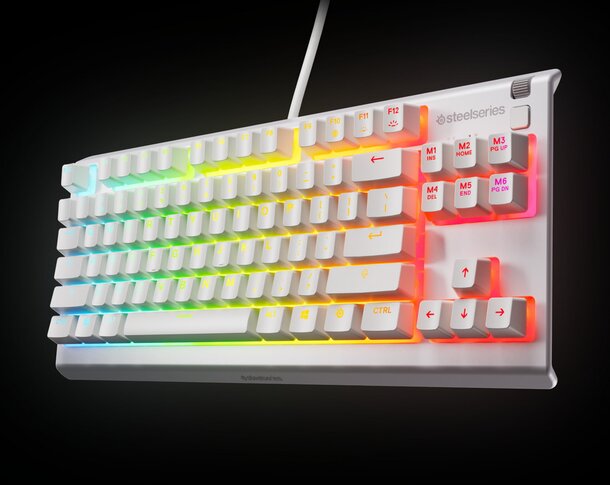 A white keyboard featuring vibrant, colorful keys arranged in a playful design.