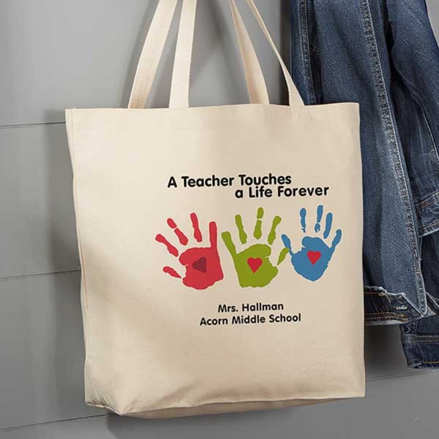 Tote bag with colorful handprints and teacher appreciation text