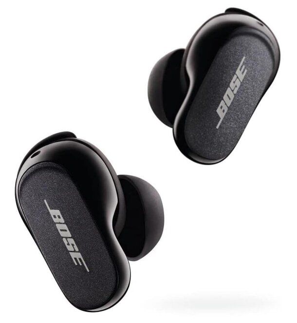 Bose QC35 wireless earbuds displayed on a white background, showcasing their sleek design and modern technology.