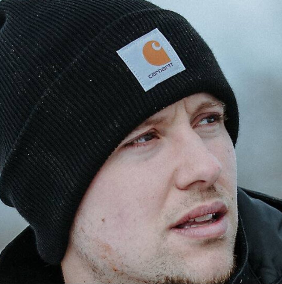 Carhartt A18 knit watch cap beanie with a folded cuff.