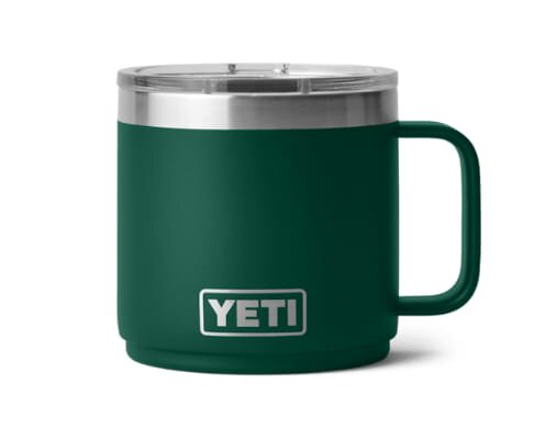 Dark green Yeti mug featuring the word "Yeti" prominently displayed on its side.