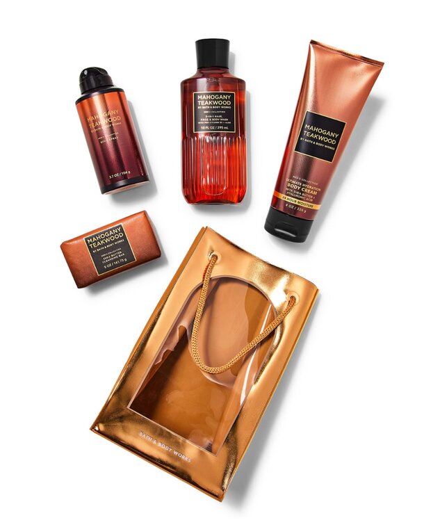 A collection of body care products featuring shower gel, body wash, and body lotion arranged neatly on a surface.
