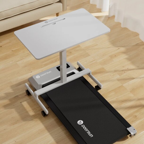 A treadmill with a laptop placed on top, suggesting a blend of exercise and remote work.
